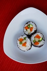 Vegetarian sushi maki rolls with tofu and nori seaweed