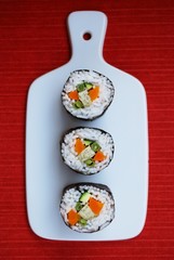 Vegetarian sushi maki rolls with tofu and nori seaweed