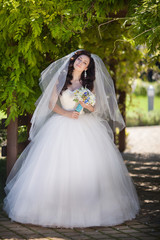 Fototapeta premium Beautiful bride in wedding day In bridal dress. newlywed woman