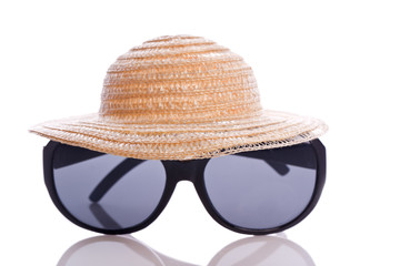 sunglasses and hat for protection in summer