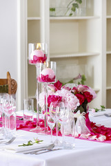 Stunning wedding decoration made of pink and red roses.