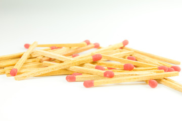 red matches on a white background