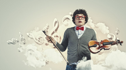 Young man violinist