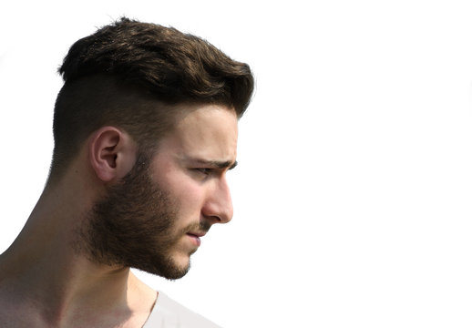 Profile shot of young man's face looking to a side