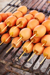 Grilled chicken eggs on the stove.