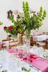 Stunning wedding decoration made of pink and red roses.