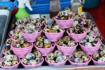 Fresh quail egg in bowl