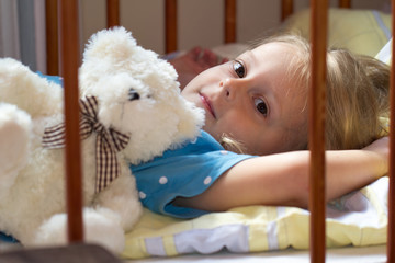 little girl with teddy bear