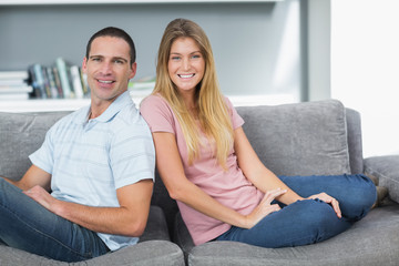 Relaxed couple sitting on the couch together