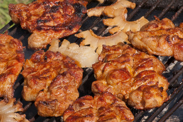 juicy pork meat and bacon on grill