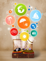 Suitcase with colorful summer icons and symbols