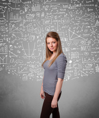 Young pretty lady with hand drawn calculations and icons