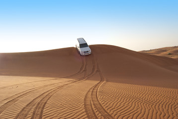 Fototapeta premium Dune riding in arabian desert