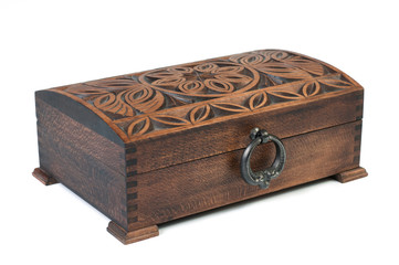 Oriental wooden jewelry box with ornaments on a white background