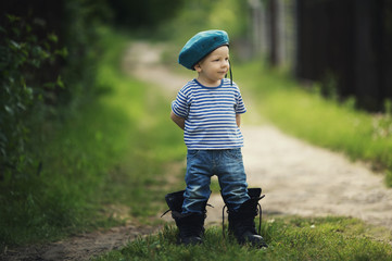 little boy in uniform