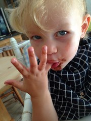 young girl eating chocolate