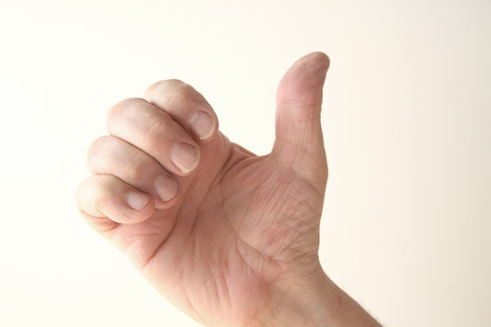 hand gesture of thumb up