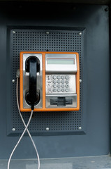 Orange Color Payphone using by call in bulgaria