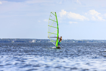 Front view of young windsurfer