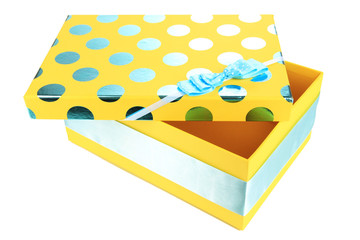 Yellow box for gifts isolated on white