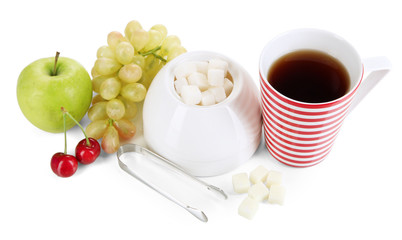 Tea cup and sugar-bowl on white background