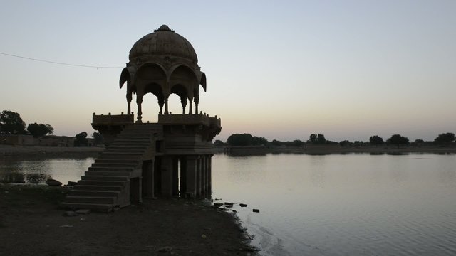 Sunrise over sacred Gadi Sagar lake in Jaisalmer