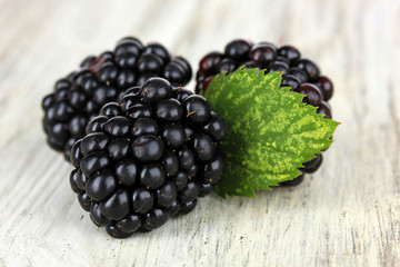 Sweet blackberries on table close-up