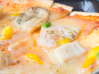 Closup of seafood topping pizza
