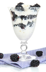 Natural yogurt with fresh blackberries isolated on white