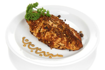 Roasted chicken fillets on white plate, isolated on white