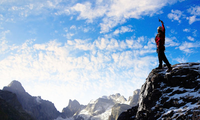 Young tourist atop of mountain