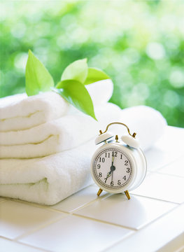 towels and alarm clock