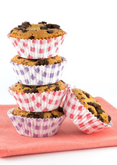 Chocolate muffins on white background