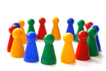 group of game figurines in a circle standing, condept: unity