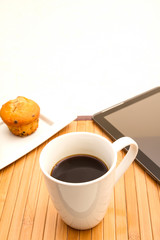 Vanilla with chocolate chips Muffins with a cup of coffee