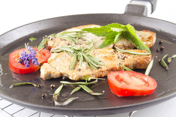 grilled pork chop with herbs