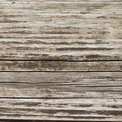 Naklejka premium Cracked and shabby wooden surface
