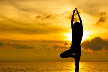 Silhouette of beautiful Yoga woman in morning