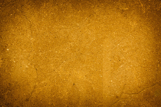 abstract gold background of elegant dark gold vintage grunge tex