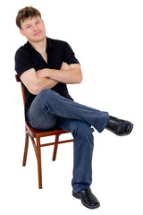 man sitting on a chair on a white background