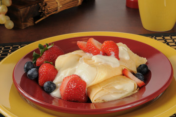 Crepes with strawberries and blueberries