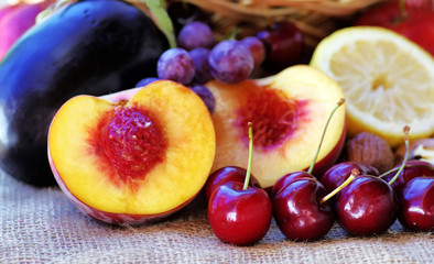 Sliced peach, berries and other fruits