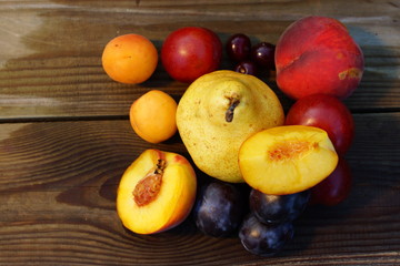 summer composition: pears, plums, peaches, apricots