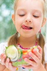 girl eating salad