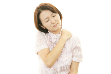 肩痛を訴える女性