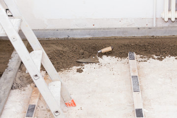 preparing a cement screed