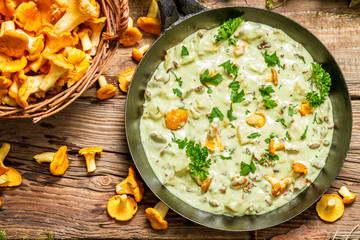 Fresh mushrooms cooked in a pan with cream