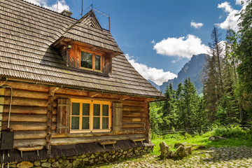 Wooden forester cottage in the mountains