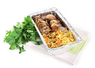 Food in box of foil on napkin  isolated in white