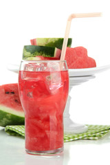 Fresh watermelon and glass of watermelon juice isolated on